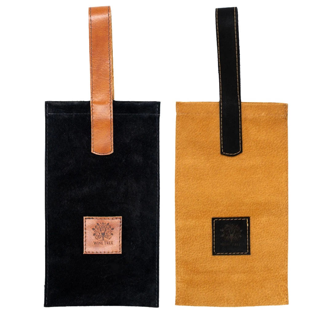 Bolsa de cuero auténtico bicolor, combinando negro y café, perfecta para regalar o transportar botellas de vino con distinción.