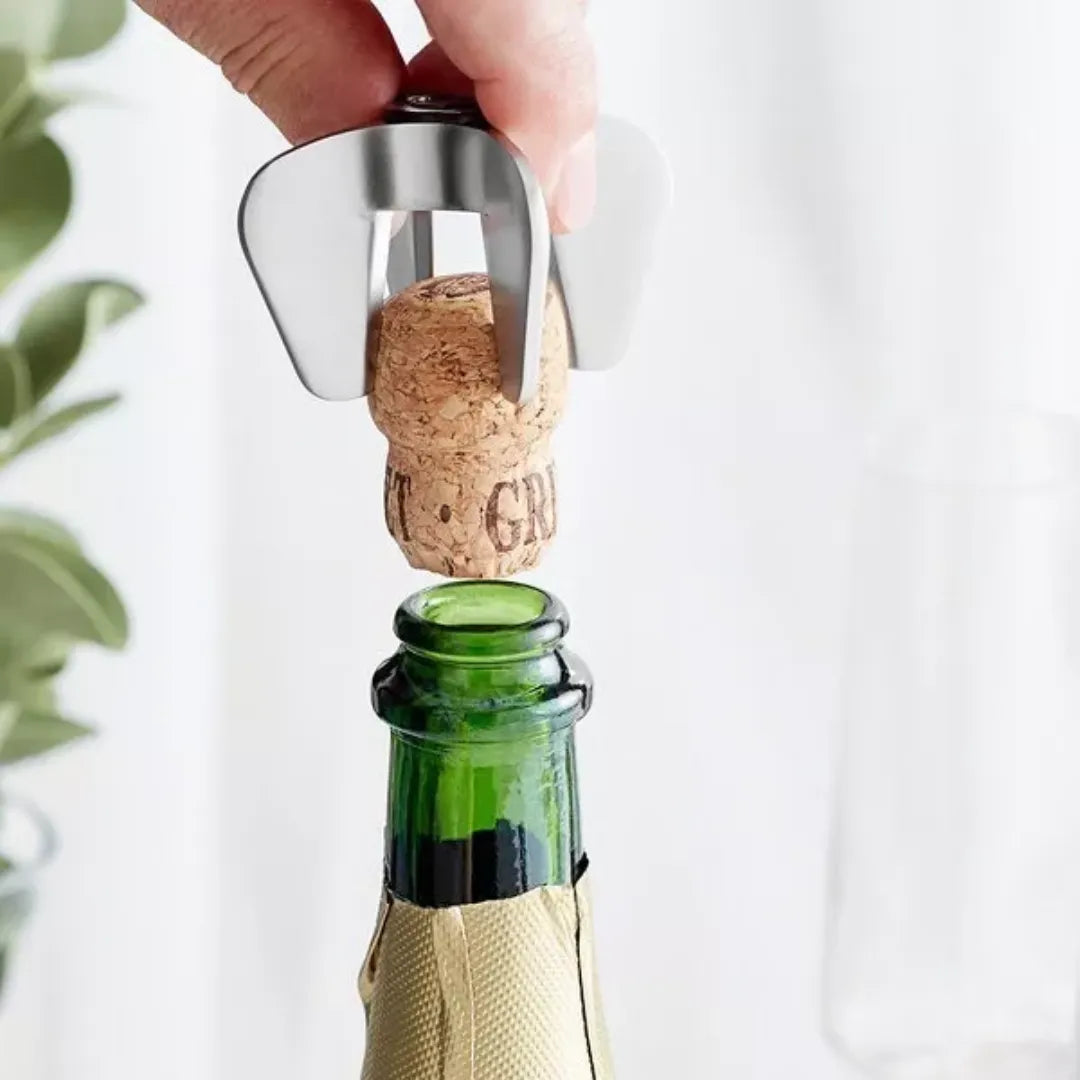 Abridor de espumante y champagne con sistema de seguridad en acero inoxidable, práctico y elegante.