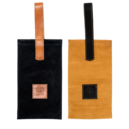 Bolsa de cuero auténtico bicolor, combinando negro y café, perfecta para regalar o transportar botellas de vino con distinción.