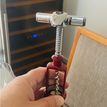 Sacacorchos articulado Ghidini fabricado en Italia, herramienta de alta calidad para abrir botellas de vino sin esfuerzo.